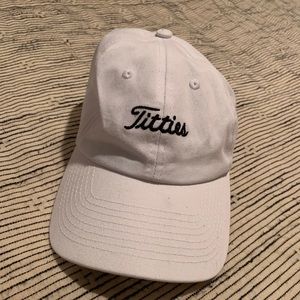 A white baseball hat from Spencers